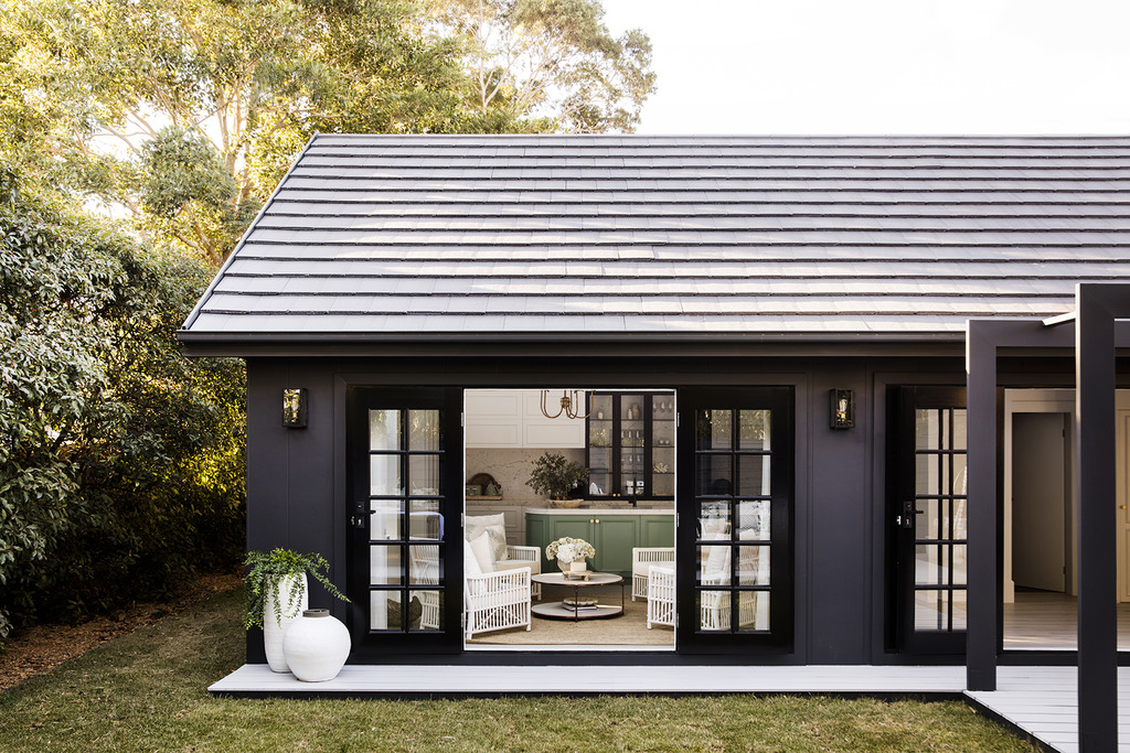 Monier roof tiles on dark coloured designer home.